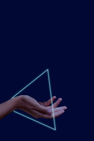 hand with neon glowing frame, dark modeの写真素材