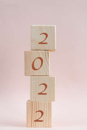 Wooden cubes pyramid with new year numbers