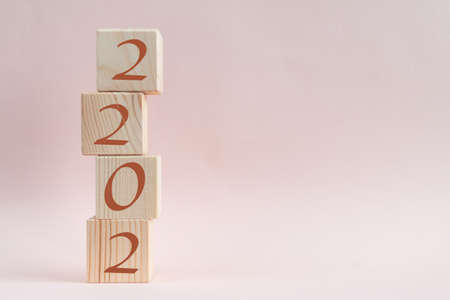 Wooden cubes pyramid with new year numbersの写真素材