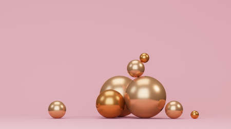 golden spheres on pink backgroundの写真素材