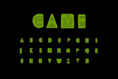 Game hand drawn vector font illustration with dots holes green on black backgroundのイラスト素材