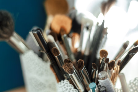 makeup brushes in a white organizer close-up.の写真素材