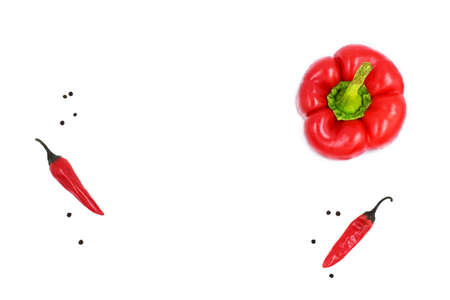 red bell bulgarian pepper and two hot peppers on a white background, isolated. A mixture of peppers. Space for textの写真素材