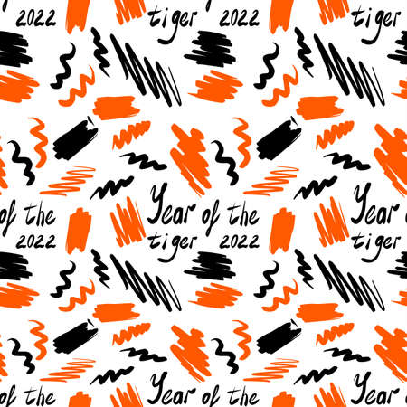 Seamless pattern. Orange and black spots and an inscription on a white background. The year of the tiger is 2022.の写真素材