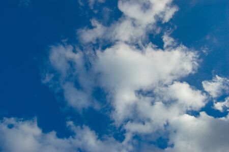 Blue sky background with clouds