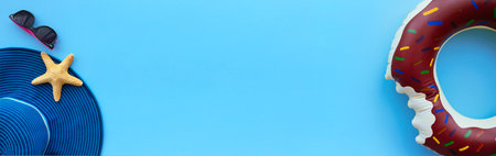 summer background wallpaper banner inflatable circle summer accessories on blue background with...