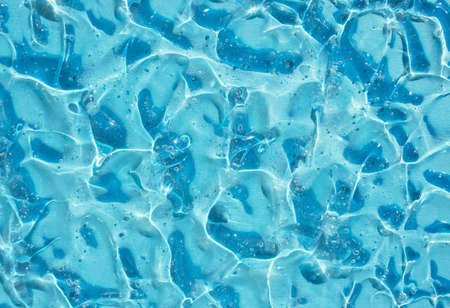 texture gel serum on blue backgroundの写真素材