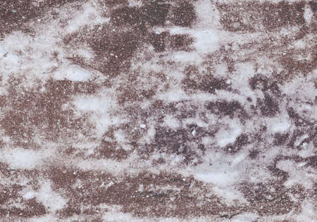 Abstract horizontal background or wallpaper. Natural ripples or blurry waves. Includes stone or foam texture, small random specks. Warm brown, gray and ivory.の写真素材