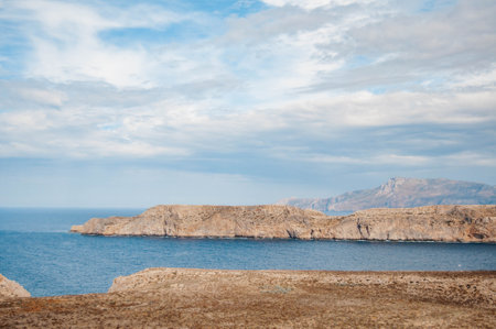 Beautiful Mediterranean summer landscape, birds eye view. Mountains and rocks, turquoise water in the bay. Gramvousa island, Crete, Greece.の写真素材