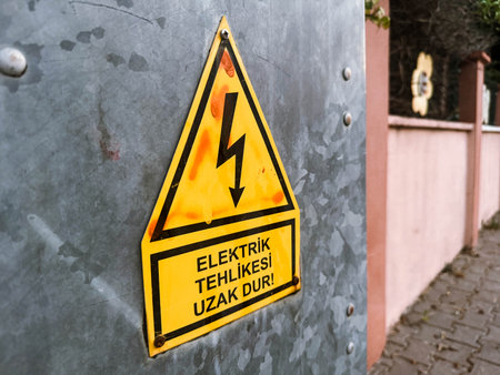 Turkey street electrical panel with lightning bolt caution sign.の写真素材