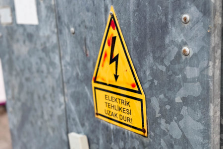 Turkey street electrical panel with lightning bolt caution sign.の写真素材