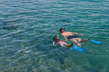 Boy and girl swimming with snorkeling in the Red Seaのeditorial素材