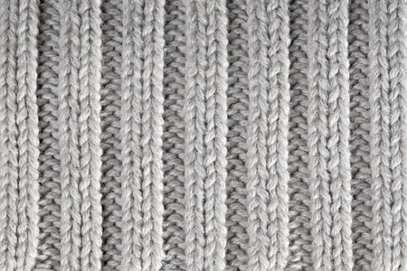 Gray knitted horizontal textured background の写真素材