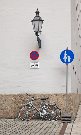 Bicycle standing on a street near the building  Munich, Germany の写真素材