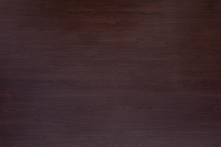 Natural brown chocolate tree wood seamless background texture, top view