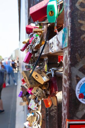BERLIN, GERMANY : AUGUST 19 ,2018: Berliner Wall ( Mauer ) East Side Gallery. Open-air gallery in Berlin. A gate made in a hole on a wall, memory where people put padlocks for luck and love. In Berlin, Germany. It consists of a series of murals painted diのeditorial素材