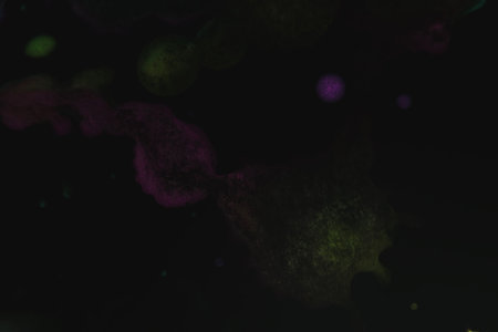 Dark background with dirty boots. Dark watercolor background, black background of watercolor stains...
