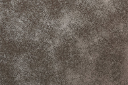 Large abstract background in dark beige stone. Rough grunge background. Scratched scuffed surface.の写真素材