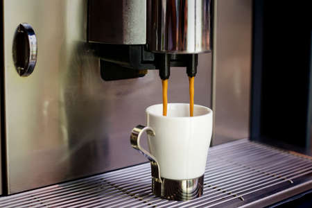 Preparation of coffee in a coffee machineの写真素材