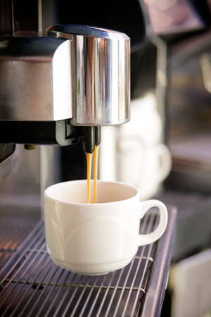 Preparation of coffee in a coffee machineの写真素材