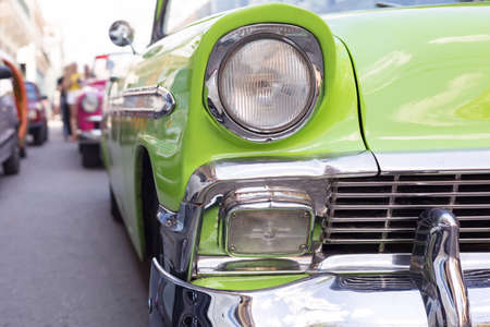Close up of oldtimer headlight. Havana, Cuba. Shallow DOF. Tonedの写真素材