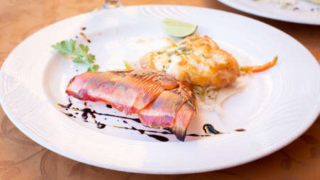 Fried lobster stuffed with cheese in a restaurant. Shallow DOFの写真素材