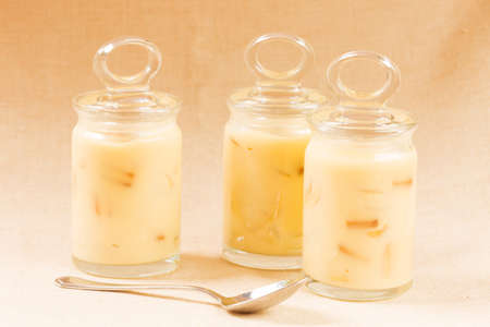 Banana pudding in the glass jars. Horizontalの写真素材