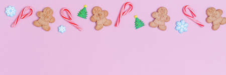 Christmas sweet treats pattern background. Flat lay holiday concept. Horizontal, banner formatの写真素材