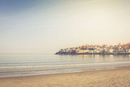 Town by the sea. Seaside living concept. Horizontal, warm toningの写真素材
