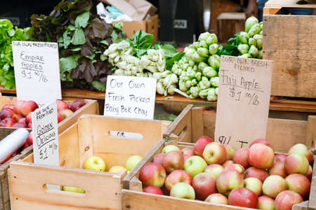 Apples at the summer outdoor farmers market. Healthy and local food and community concept. Horizontalの写真素材