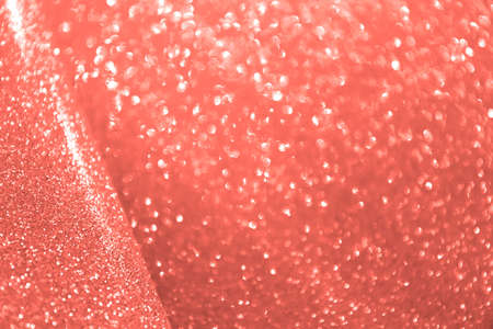 Living Coral shade. Pantone color trends of the season. Spring summer collection. Blurred toned background, shallow depth of field. Horizontalの写真素材