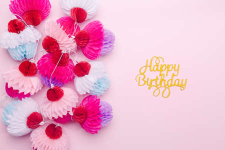 Paper cupcakes garland and happy birthday lettering on pink background. Party and celebration concept. Fits great for your any project! Horizontalの写真素材