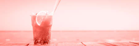 Concept of luxury vacation. Cuba Libre cocktail on the pier. Long island ice tea cocktail on the...
