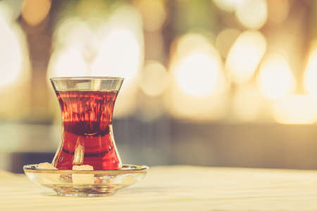Turkish tea outdoor. Turkish cuisine and travel  concept. Horizontal, warm toningの写真素材