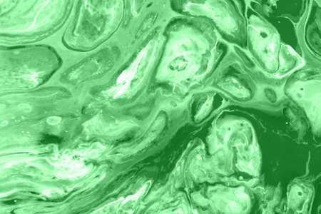 Abstract background made with fluid art technique in light green mint color. Trendy colorful backdropの写真素材