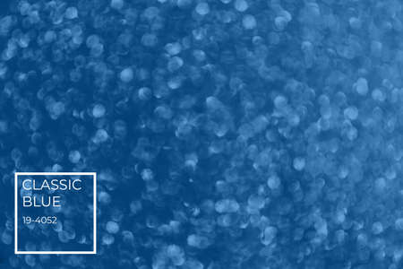 Blurred glitter blue background with color tag for holiday and any project. Shallow depth of field. Horizontalの写真素材