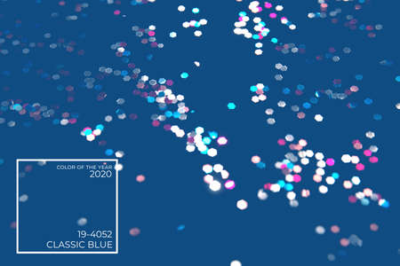 Classic blue background with bright multicolor bokeh lights and color tag. Holiday, Christmas and New Year background. Horizontalの写真素材