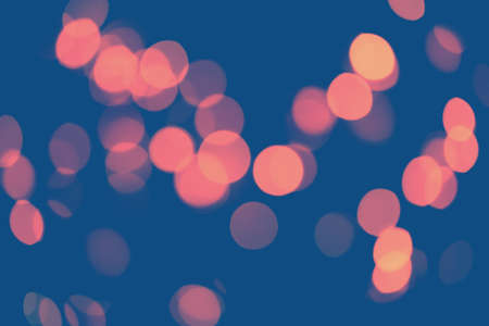 Classic blue background with soft pastel bokeh lights. Holiday, Christmas and New Year background. Horizontalの写真素材