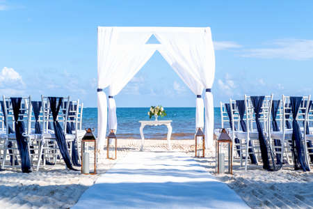 Blue themed wedding setup at the white sandy beach. Romantic getaway wedding. Horizontalの写真素材