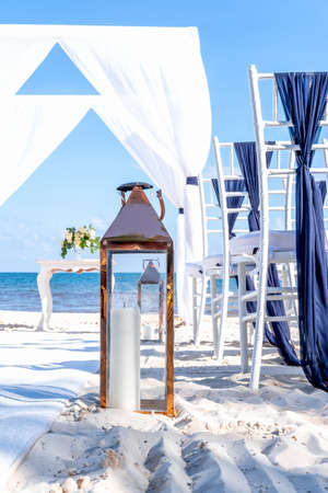 Details of blue themed wedding setup at the white sandy beach. Romantic getaway wedding. Verticalの写真素材