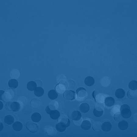 Creative pastel fantasy holiday card with party confetti in classic blue. Baby shower, birthday, celebration concept. Squareの写真素材