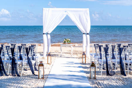 Blue themed wedding setup at the white sandy beach. Romantic getaway wedding. Horizontalの写真素材