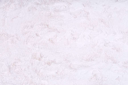 White vegan faux fur texture background. Eco friendly trendy alternative to natural fur. Modern material texture. Eco friendly shopping conceptの写真素材