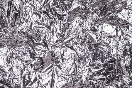 Shimmering destructured silver foil background. Perfect background for any holiday project, place for text. Horizontalの写真素材