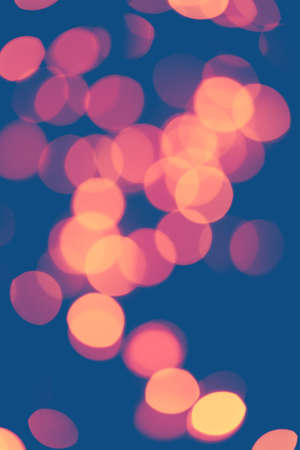 Classic blue background with soft pastel bokeh lights.Holiday, Christmas and New Year background. Ideal to layer with any design. Horizontalの写真素材