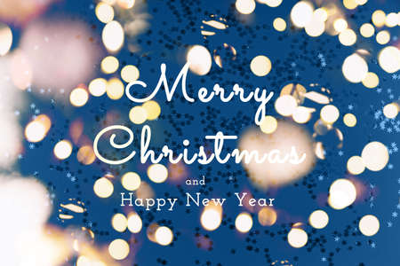 Snowflake sprinkles on blue background. Holiday, Christmas and New Year concept. Horizontal with...