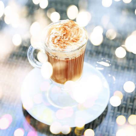 Irish coffee in an outdoor bar. Concept of St Patrick holiday. Holiday background. Irish national...