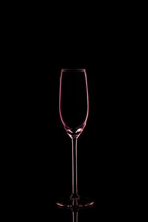 Champagne glass on the dark background.. Fine cristal glassware concept. Verticalの写真素材