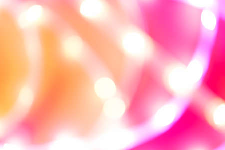 Futuristic blurred neon drop in yellow, orange and pink color with place for text, easy cut to bannerの写真素材