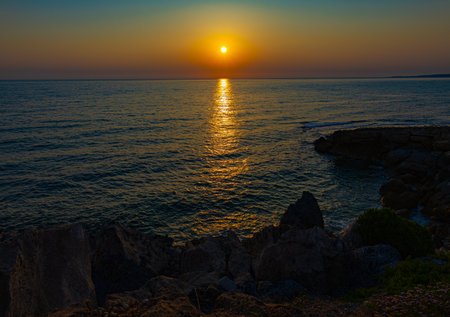 Dramatic sunset over Mediterranean sea in Cyprusの写真素材